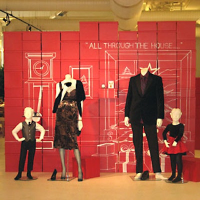 Inside the event’s eventual location at Metropolitan Pavilion, boxes decorated with quotes from The Night Before Christmas provided the backdrop for holiday clothing displays.