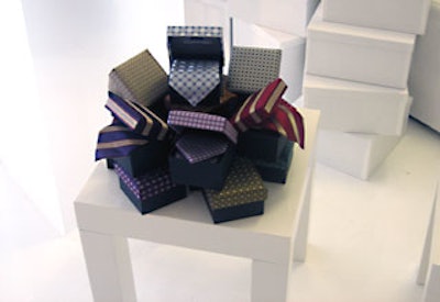 EventQuest’s Anthony Larrisey displayed ties in boxes placed on top of more boxes.