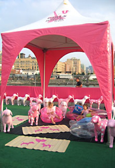 Inflatable chairs, pillows, and tatami mats were arranged under the Girls That Rock Tour tent.