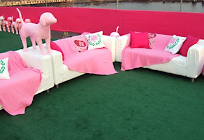 Customized pillows and blankets covering comfy couches matched the pajama party motif.