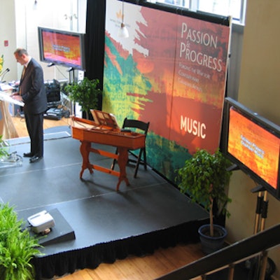 Potted Boston ferns from Avenue Flower adorned the stage area.