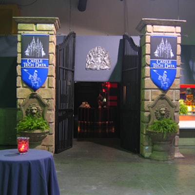 Faux brick pillars and wrought iron gates embellished the entrance to one of the party rooms.