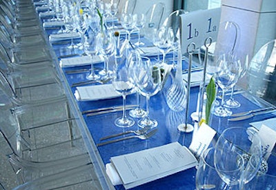 Clear glasses and vases matched the Lucite tables filled with blue tempera pigment.