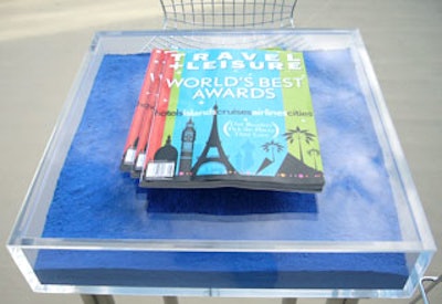 Smaller versions of the custom tables displayed magazines—and, later, guests’ drinks—outside.