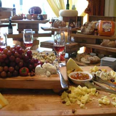 An international cheese station was set up on a multilevel wooden butcher-block display.