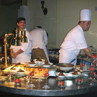 Chef David Flores served pan-fried filet mignon with Cajun-seasoned potato and vegetable terrine and cranberry gastrique, representing Mexico.