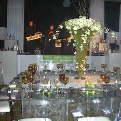 Acrylic tables and chairs from Ice Magic and Bill Whidden Designs served as the subtly striking main decor elements at the dinner reception.