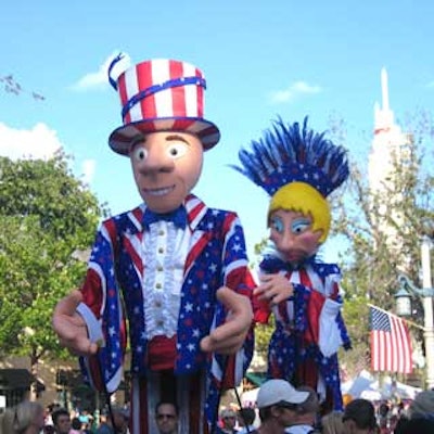 For the town of Celebration's July Fourth bash, Metropolis Productions' 15-foot-tall patriotic puppets roamed through the crowd.