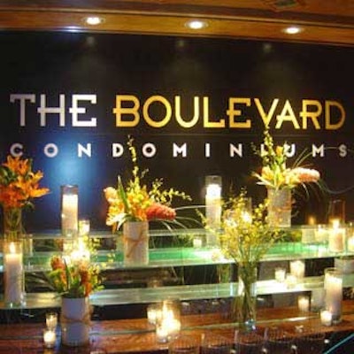 The bar inside the Valencia Garden Restaurant was decked out with flowers, candles, and branding.