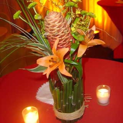 conceptBAIT's floral arrangements featured Cymbidium orchids, shampoo ginger, and stargazer lilies.