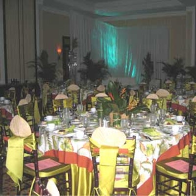 For the South Florida chapter of Meeting Professionals International installation dinner, tables featured tropical-patterned linens and centerpieces.