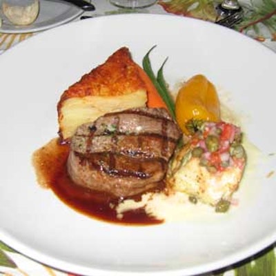 Guests dined on a dual entr?e of sea bass with citrus beurre blanc and filet mignon with cabernet sauvignon demi-glace paired with potatoes and fresh vegetables.