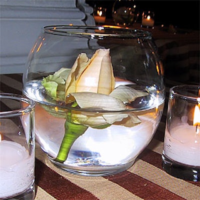 Stefan's placed roses in small fish bowls filled with water for a simple floral look.