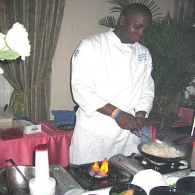 Chef Steve Mendez from Nikki Marina cooked rock shrimp with scallops served on truffle herb crostini on a bed of champagne-dressed lettuce with potatoes.