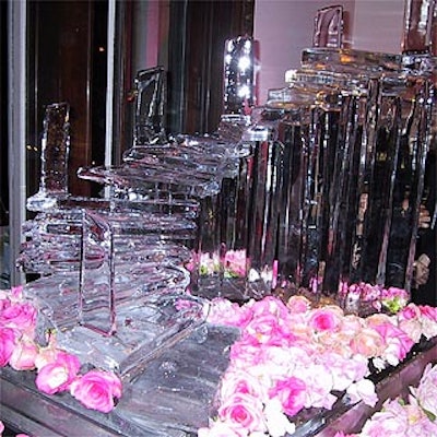 Ice Fantasies created an ice sculpture for the reception, and Chazz Levi covered it in flowers.