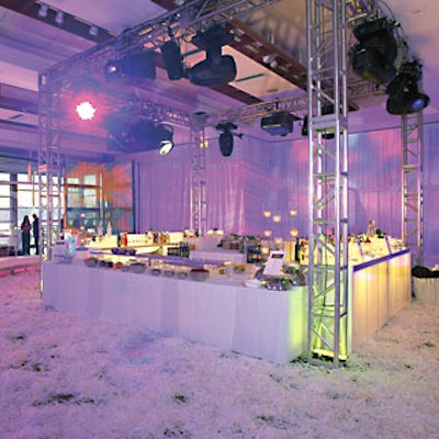 To match the all-white look of the Krisam Group's promotional dinner, Empire Force Events covered the patterned carpet in Pier Sixty's Olympic room with several feet of Flutter Fetti.
