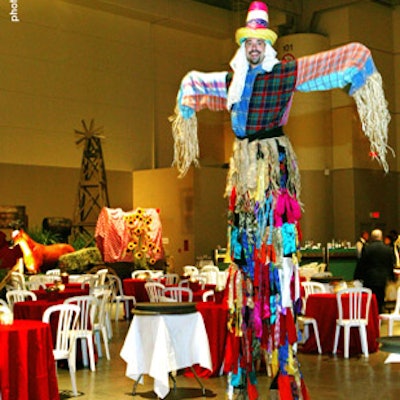 A stilt walker dressed as scarecrow from Zero Gravity Circus roamed the venue.