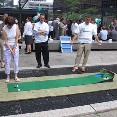 Guests played miniature golf at the interactive sports barbecue station.