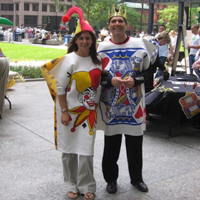 Playing card designs decorated T-shirts worn by members of the employee team responsible for casino barbeque station.