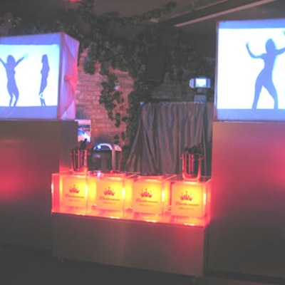 Budweiser's display had lit cubes showing videos of shadow dancers.