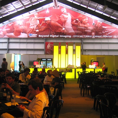 A bar with yellow lighting from AVW Telav was a focal point in the ACES V.I.P. lounge.