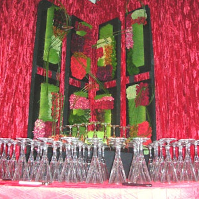 Designs by Sean's floral art extended the look of the bar and played up the event's 'vertik'l' theme.