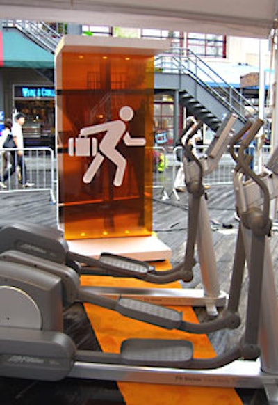 Each station had a pictogram on a sheet of bright orange plexiglass and two pieces of gym equipment for the competitors.
