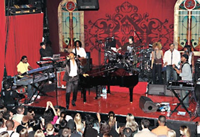 The night before the awards show, John Legend premiered his latest album at the Bowery Ballroom. Momentum produced the event—sponsored by Verizon Wireless and Rolling Stone—converting the venue’s stage into a Victorian-inspired set with deep red accents and faux stained glass windows.