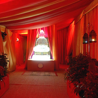 Two five-foot-tall Buddha-shaped ice sculptures dominated the entryways to the party.