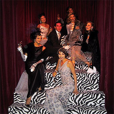 Models dressed in 30's clothing lounged near the entrance to the Whitney's gala.