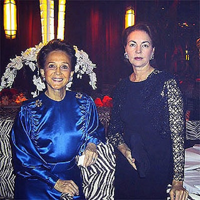 Loving & Weintraub's Harriet Weintraub (left) and Virginia Coleman posed in the dining room while making last-minute adjustments before the event.