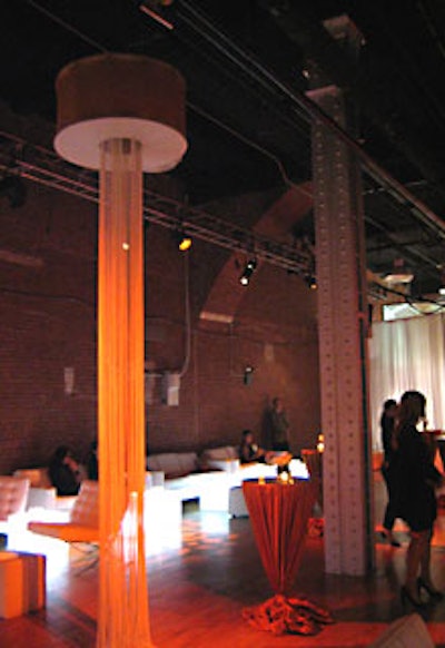 Column-like installations of pearls swayed as guests passed.