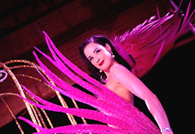 Dita Von Teese, one of the women included in the photos, performed her new birdcage act during the after-party.