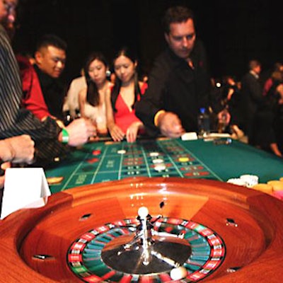 Cozmocard’s “Vegas in L.A.” event bought 40 casino-style tables to Santa Monica’s Barker Hanger.