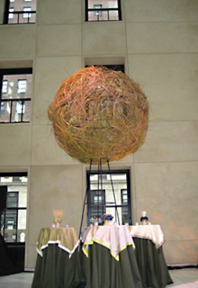 Stark created a 16-foot-tall orb made from woven willow reeds to accent the decor.