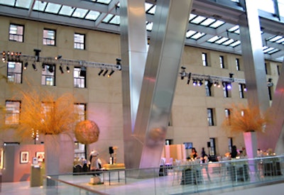 Two arrangements of weeping willow were adjacent to the Hearst Tower’s massive V-shaped steel columns.