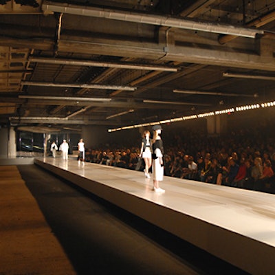 Y-3’s show mimicked an assembly line with conveyor belts on the runway.