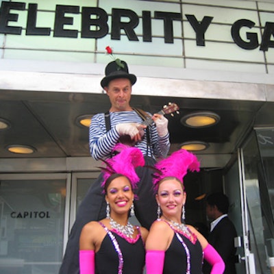 Showgirls from Champagne Showgirls and a stilt walker from Zero Gravity Circus greeted guests at the entrance to the theatre.