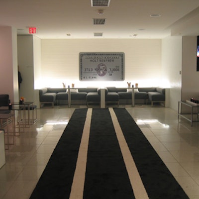 A custom carpet runner in the V.I.P. lounge resembled a subway train track.