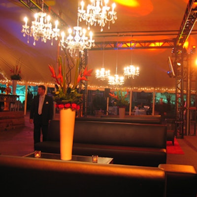 Chandeliers in arrangements of three hung from lighting trusses in the smaller lounges.