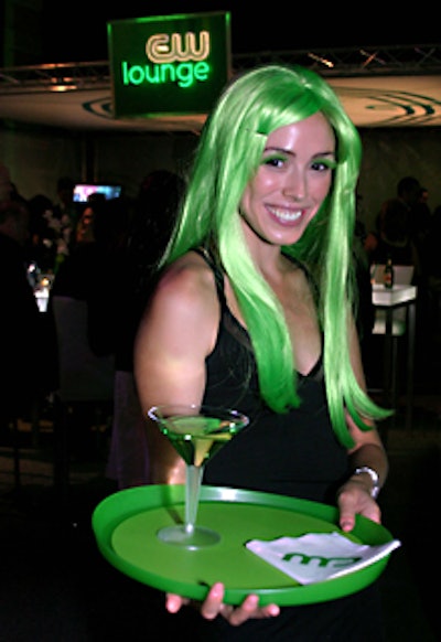 Female cocktail servers from Beautiful Bartenders wore neon green wigs.