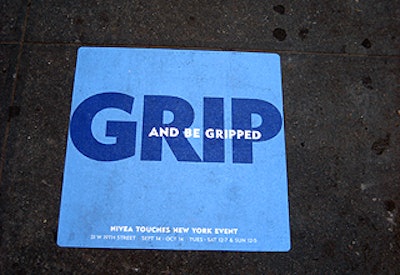 Nivea is reaching out to consumers this month by placing blue-colored advertisements on sidewalks within a few blocks of the exhibit.