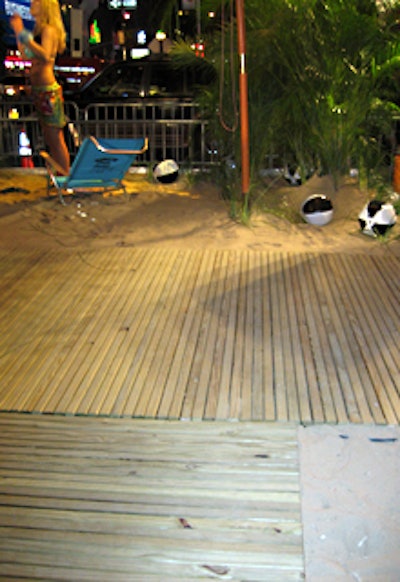 Instead of a typical red carpet entrance, a boardwalk led the way into the party.