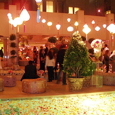 Lanterns hung over the pool at the Sunset Tower Hotel for Teen Vogue's 'Young Hollywood' issue party.