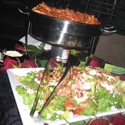 The Chef's Table prepared mixed green salad with strawberries, walnuts and feta cheese with balsamic vinaigrette and penne with spicy red tomato sauce with peppers.