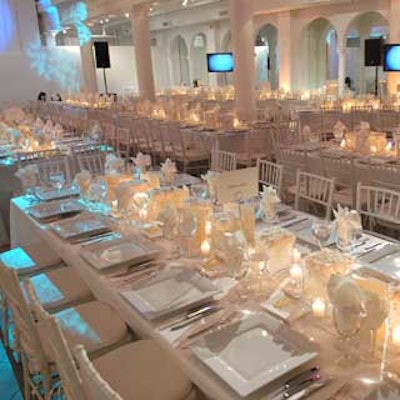 Atlas Party Rentals dressed tables with monochromatic linens and accents to create an ethereal look.