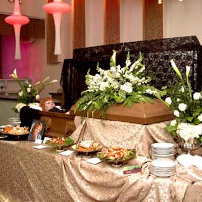 Outside the Lines placed a real coffin on one of the buffet tables, where a performer from Wise Guys interacted with hungry guests.