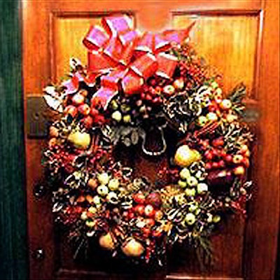 David Beahm Designs Inc. can create holiday floral arrangements like this fruit wreath.