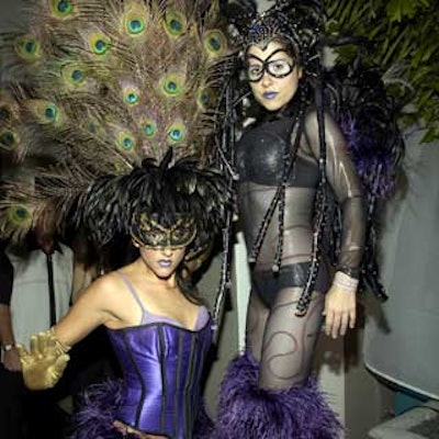 CircX provided fantasy performers, like this peacock and glow-in-the-dark stiltwalker.