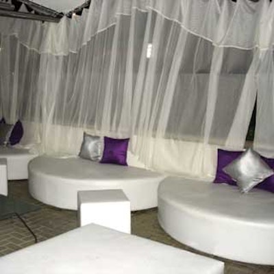 McKinley Smith of McKinley-Pierre Furniture decorated the entire restaurant in white and purple to further enhance the erotic mood.